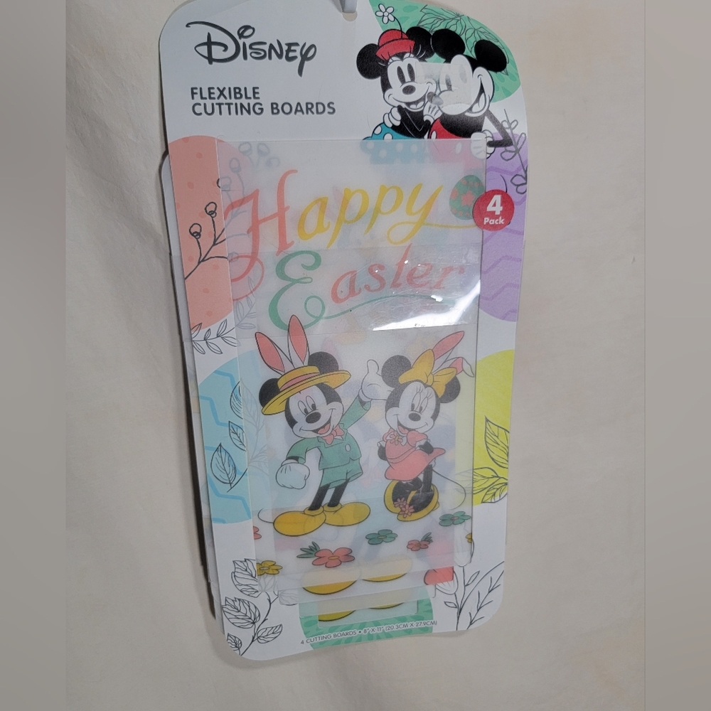 Brand new Disney's Mickey & Minnie Mouse Easter 4 pack of cutting boards.
